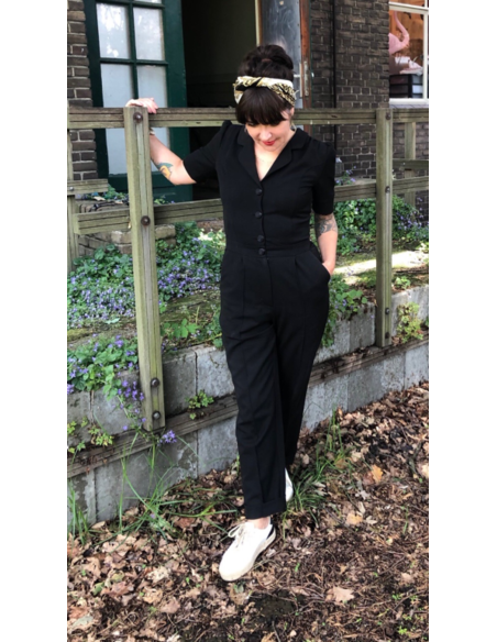 Welke schoenen onder zwarte jumpsuit